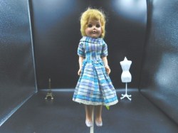 10.5" CIRCA 1950S HARD PLASTIC BLONDE FASHION DOLL, WINDOW PANE / SATIN DRESS CHOICE